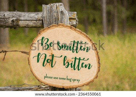 Horizontal Photo of a Farm theme Joyful celebration with wooden sign, elegant design, romantic message, and beautiful decoration hanged in a fence.