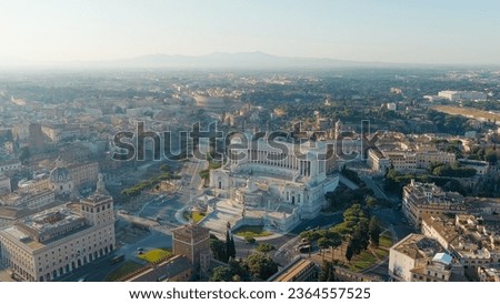 Rome, Italy. Vittoriano - Monument to the first king of Italy, Victor Emmanuel II. Flight over the city. Panorama of the city in the morning. Backlight. Summer, Aerial View   Royalty-Free Stock Photo #2364557525
