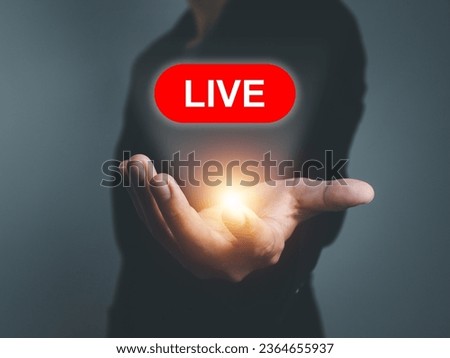 Businessman performing live broadcast Online Broadcasting Watch live business streams in a digital virtual window.