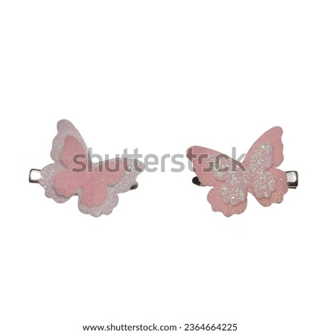 a lovely set of white and pink butterfly hair clips with glitter. Isolated on white. Royalty-Free Stock Photo #2364664225