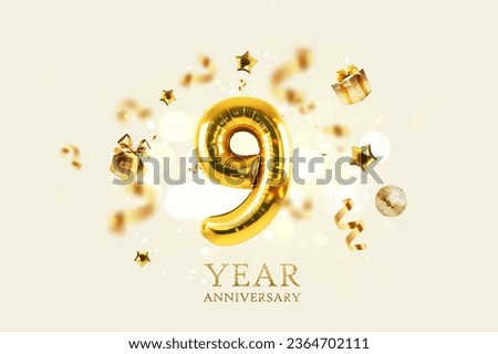 Gold festive balloons 9 year anniversary with golden confetti, presents, mirror ball and stars fly on a beige background with bokeh lights and sparks. Birthday luxury nine card, a creative idea Royalty-Free Stock Photo #2364702111