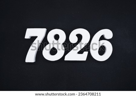 Black for the background. The number 7826 is made of white painted wood.