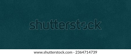 Dark green matte background of suede fabric, closeup. Velvet texture of seamless navy blue leather. Felt material macro. Royalty-Free Stock Photo #2364714739