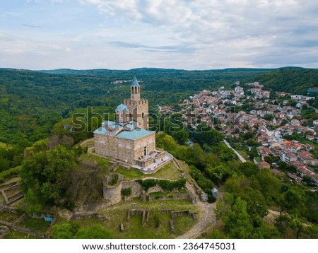An aerial view of Veliko Tarnovo reveals a Bulgarian city rich in history and culture, with its beautiful buildings, streets, and picturesque hills. Royalty-Free Stock Photo #2364745031