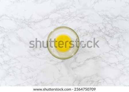 Flat lay. Melted sticks of unsalted butter on the counter. Royalty-Free Stock Photo #2364750709