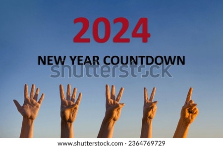 Happy New Year 2024 countdown. Transition from 2023 to new year 2024 concept, hands counting down. High resolution photo image can be used as large display, print, website banner, social media post.