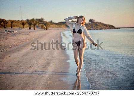 danish girl walking on the beach