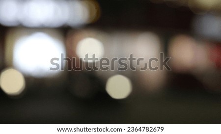 Blurred background photo.CityScape bokeh.  Defocused abstract city.Background from focus.Can be used as wallpaper