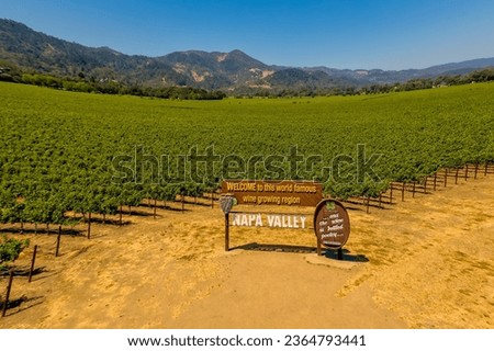 Field of grape vines and sign for wine of Napa Valley California Royalty-Free Stock Photo #2364793441