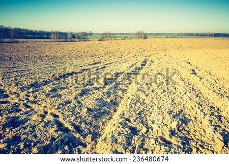 vintage photo of winter plowed field