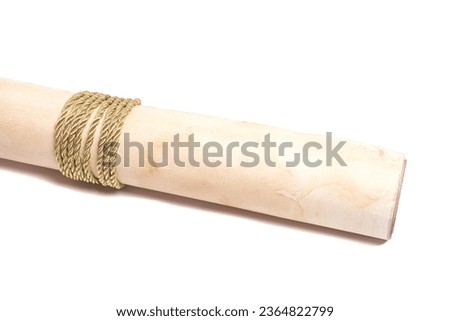 scroll of antique paper tied with a golden rope.