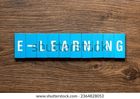 E - learning - word concept on building blocks, text