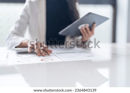 Business woman hand presses on screen digital tablet Online Digital marketing  technology.