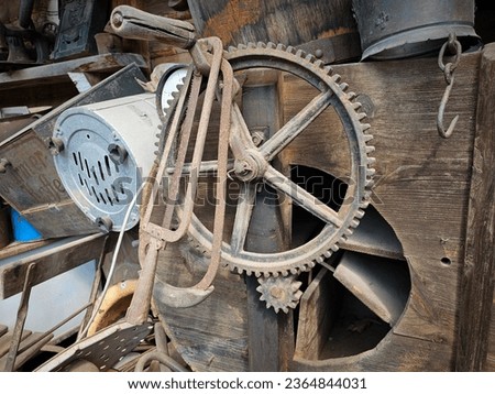 An interesting collection of old metal objects from different eras in a scrapyard near Wałbrzych, Poland. Royalty-Free Stock Photo #2364844031