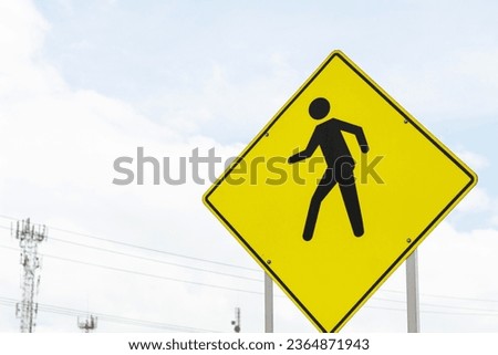 Approach to a traffic sign that announces pedestrians on the road. Signs on the road. Prevention while driving.