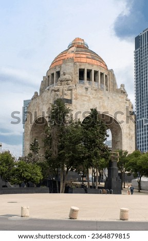Vertical view of the emblematic Monument to the Revolution in downtown Mexico City. Royalty-Free Stock Photo #2364879815