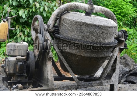 Close up photo of a large and sturdy building material mixer