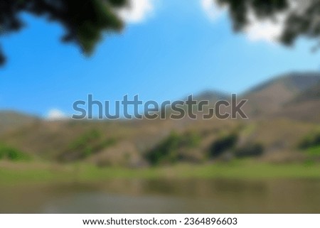 Blurred photo of views of hills and lakes