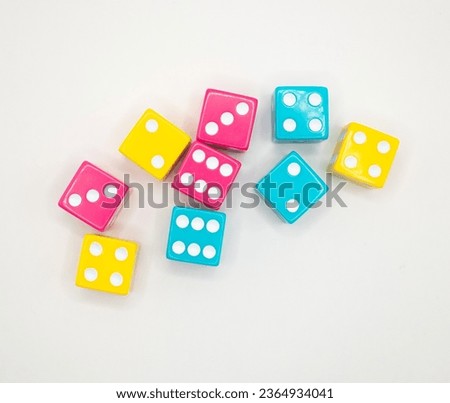colorful dice on a white background  Royalty-Free Stock Photo #2364934041