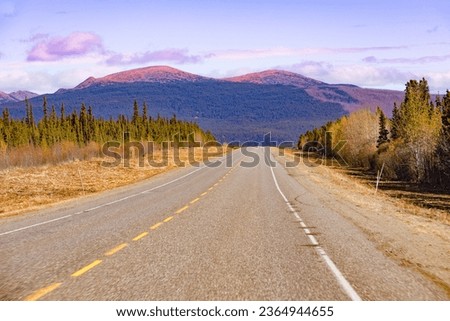 Alaska Highway Alcan in great empty nature wilderness landscape of Southern Yukon Territory, YT, Canada Royalty-Free Stock Photo #2364944655