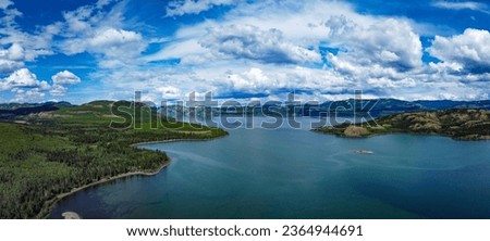 Lake Laberge boreal forest taiga wilderness aerial panoramic summer landscape, Yukon Territory, YT,  Canada Royalty-Free Stock Photo #2364944691