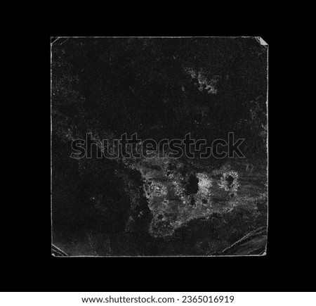 Old Black Square Empty Aged Damaged Paper Cardboard Photo Card Isolated on Black.  Folded Edges. Square CD Vinyl Cover Package Envelope. Rough Grunge Shabby Scratched Torn Ripped Texture. 