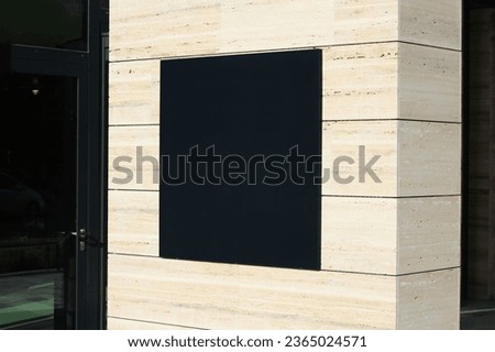 Blank Office sign on a elegant marble wall for advertising mockup. Empty mock up template for logo, branding and corporate identity of office shop, cafe, restaurant.