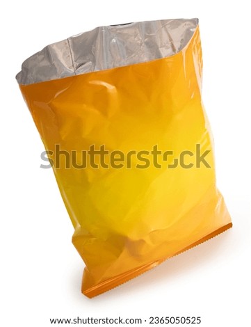 Empty Foil and plastic snack bags mockup isolated on white background, Yellowl pillow packages for food production, snack wrappers on White Background With clipping path. Royalty-Free Stock Photo #2365050525