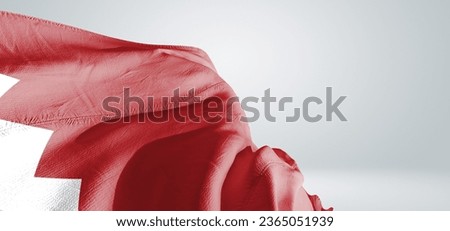 Bahrain national flag cloth fabric waving on beautiful light grey Background. Royalty-Free Stock Photo #2365051939