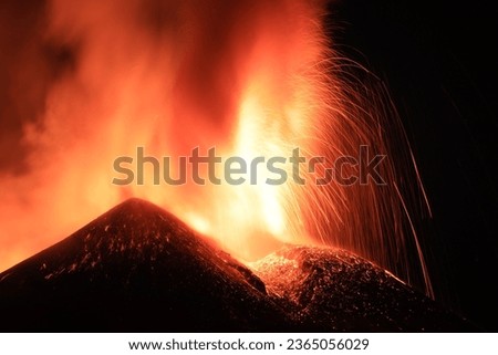 Etna - Great lava explosion detai view of top active crater in the night; Taken 13 August 2023. Royalty-Free Stock Photo #2365056029