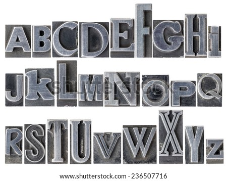 English alphabet - a collage of 26 isolated letters in letterpress metal type printing blocks, a variety of mixed fonts