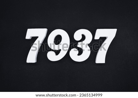 Black for the background. The number 7937 is made of white painted wood.