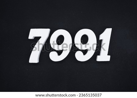 Black for the background. The number 7991 is made of white painted wood.