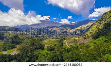 This is a photo of Mount Ciremai.
Mount Ciremai, also known as Mount Ceremai, is one of the prominent volcanoes on the island of Java, Indonesia.
Located in West Java Province. Royalty-Free Stock Photo #2365180083