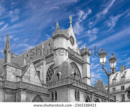 Great gothic church of Saint Germain l Auxerrois (against the background of sky with clouds), Paris, France