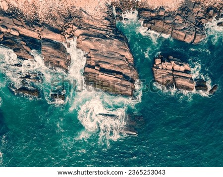 drone shot aerial view top angle bright sunny panoramic photo of  sea waves crashing rocks in coastline sea ocean turquoise blue water tourism Kerala God's own country india tamilnadu wallpaper 