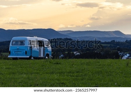 campervan german volkswagen at sundown landscape evening vwbully Royalty-Free Stock Photo #2365257997