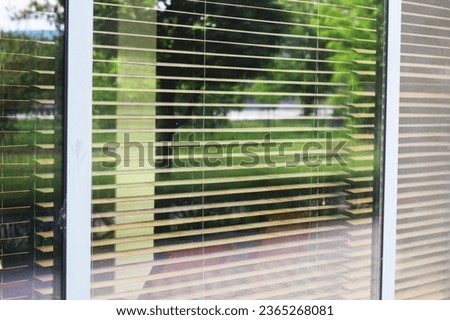Empty shop window with blinds for business brand, restaurant, office logo mockup. Blank office window copy space mock up template.