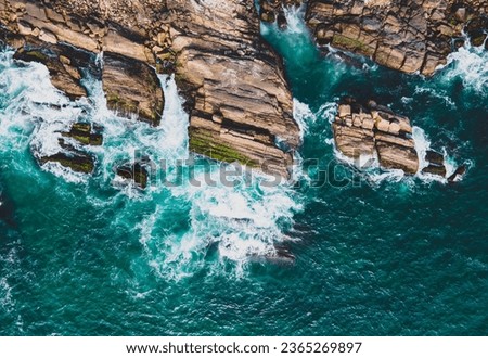drone shot aerial view top angle bright sunny panoramic photo of  sea waves crashing rocks in coastline sea ocean turquoise blue water tourism Kerala God's own country india tamilnadu wallpaper 
