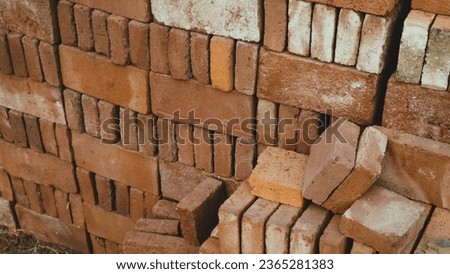 Stack of red bricks textured background