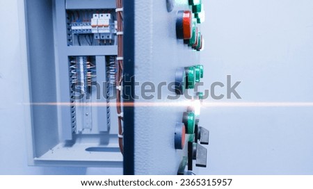 Electrical panel control with indicator lamp for hvac control. with shiny light nice for background.