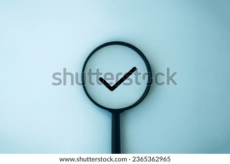 Magnifying glass and check mark icon. Business concept,idea,right choice, quality control, approval and contract assignment