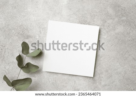Invitation, flyer or greeting card mockup with natural eucalyptus twig, blank card mock up with copy space Royalty-Free Stock Photo #2365464071