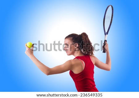 Woman playing tennis on white