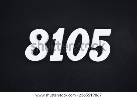 Black for the background. The number 8105 is made of white painted wood.