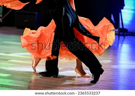 couple dancing standard dance on the dancefloor Royalty-Free Stock Photo #2365533237