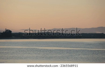 Sunset landscape on the lake
