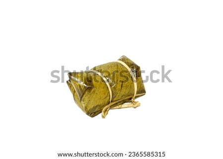 Coconut Sticky Rice and Banana wrapped with Banana Leaf dessert of Thailand.white background isolates pictures.