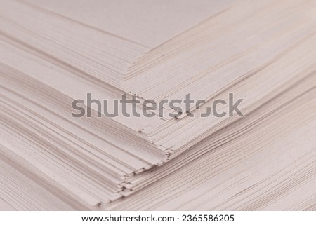 grey low-quality thin paper from recycled waste, paper used for writing recycled paper from recycled materials
