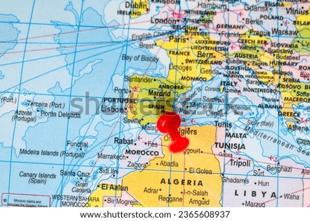 This stock image shows the location of Spain on a world map